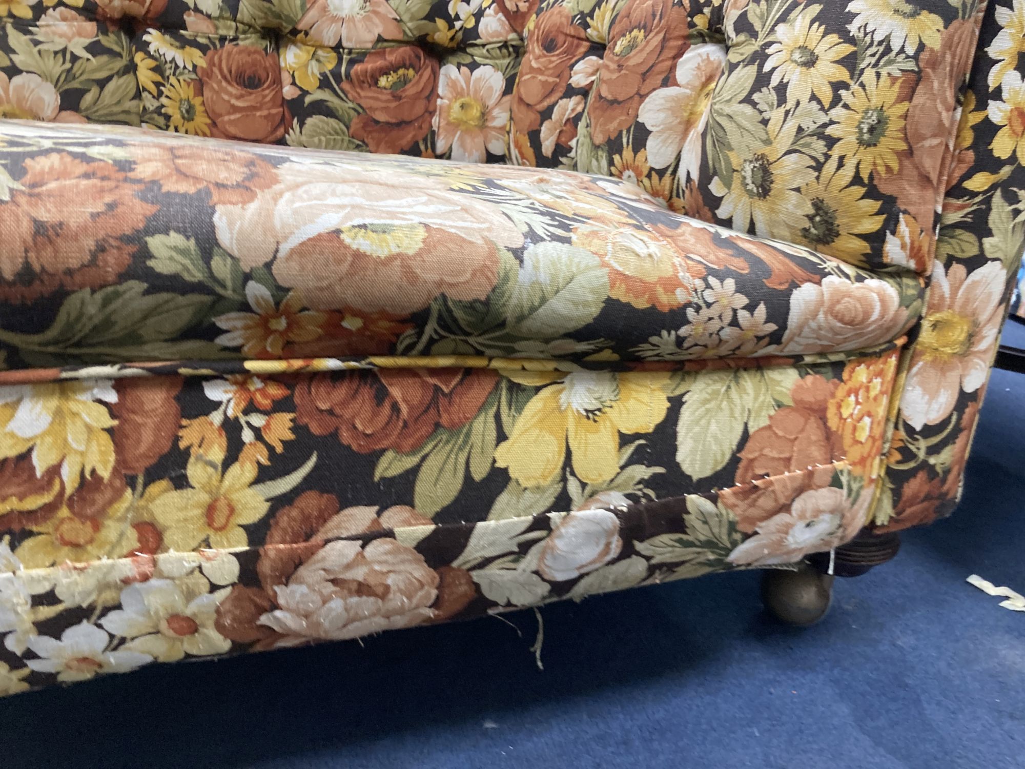 A Victorian floral upholstered Chesterfield settee, length 200cm, depth 85cm, height 68cm